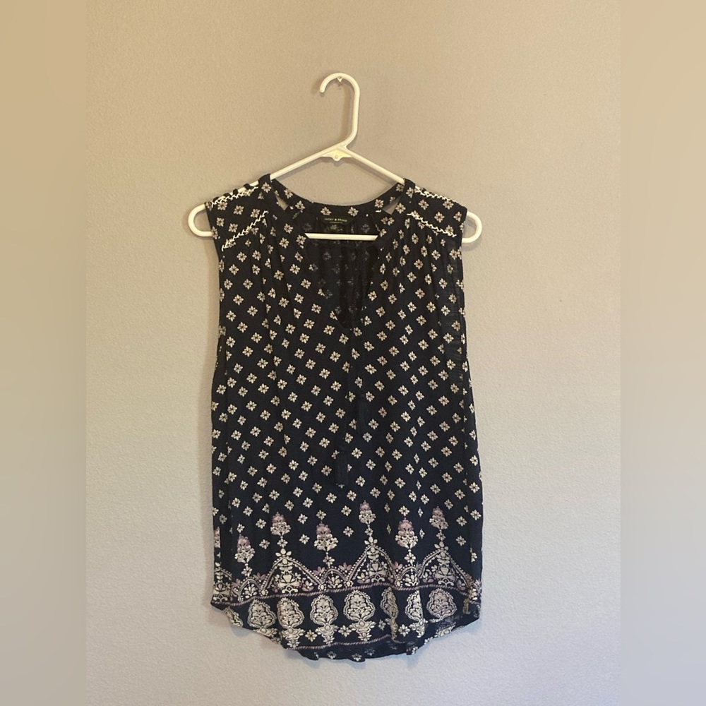 - Lucky brand woman’s bohemian blouse. Size large.
